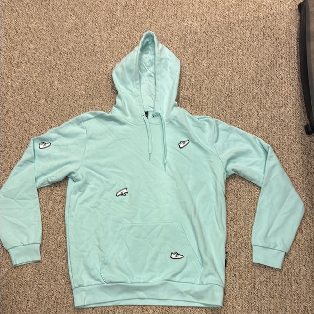 Light Blue Hoodie with Embroidered Details